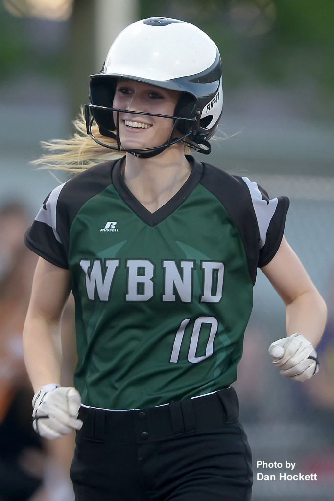 Photo by Dan Hockett West Burlington – Notre Dame’s Kori Mesecher smiles as she rounds third after hitting a homerun against Keokuk in the fifth inning Tuesday night in West Burlington. WB-ND finished the night with 3-homeruns against Keokuk. West Burlington – Notre Dame defeated Keokuk, 8-5. 